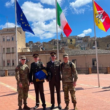 Cadet Wineriter and Cadet Darby standing with two of the Ukrainian Cadets in the Piazza Armenia. 