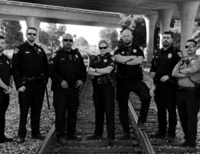 Sgt. Dawn Delfino, a 1999 Norwich University graduate, stands among her Gilroy Police Department colleagues on April 5, 2019, on Love Your Team Day. (Photo courtesy Dawn Delfino.)